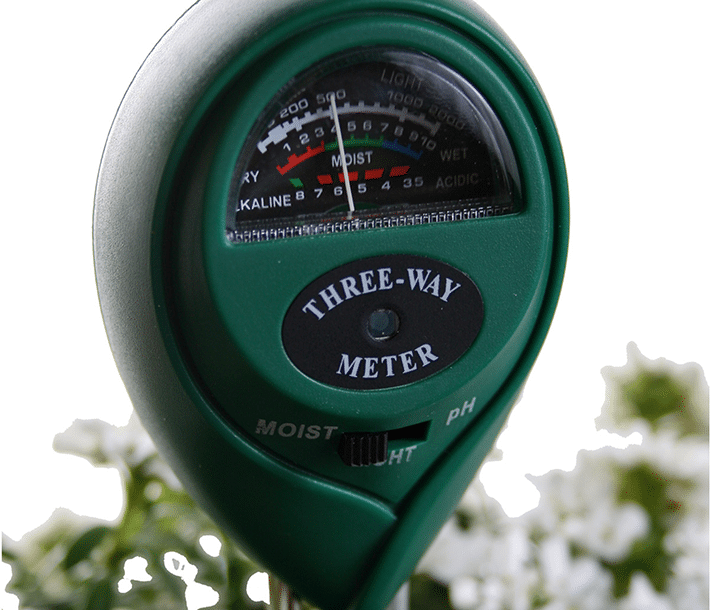 Close-up of Active Air 3-way meter's gauge in a pot of flowers, transparent background