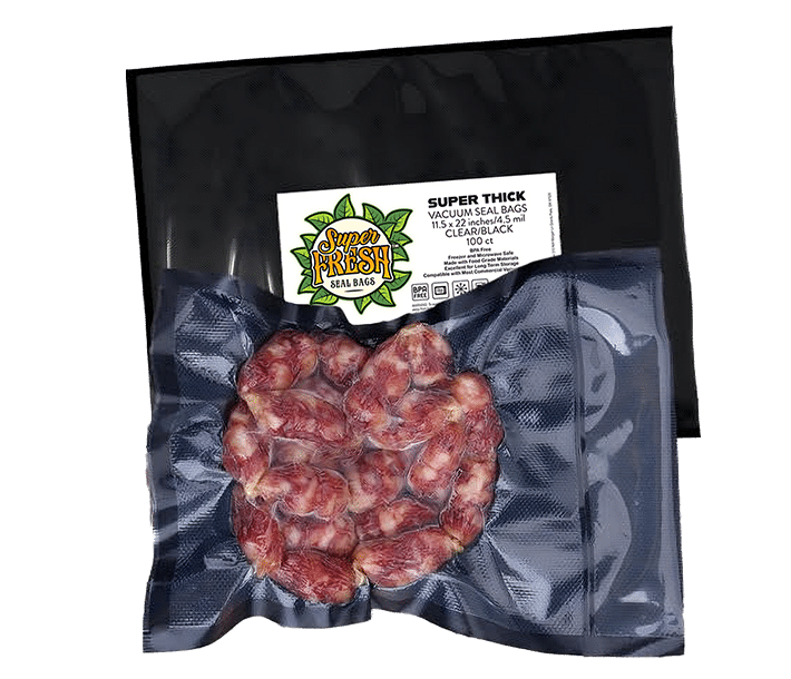 A transparent vacuum-sealed bag from SuperFresh Vacuum Seal Bags containing a red meat product, possibly sausages or meat rolls. The black and clear bag, measuring 11.5x22 inches, displays the product clearly through the plastic. The label on the bag includes the brand logo with green leaves, product information, and certification logos indicating BPA free and recyclable material.