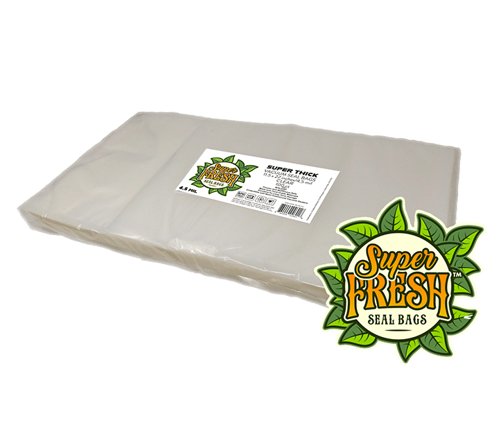 A stack of clear SuperFresh Seal Bags, super thick and suitable for vacuum sealing, each measuring 11.5x22 inches. The stack is sealed and carries a label featuring the SuperFresh logo with green leaves, detailed product information, and a QR code.